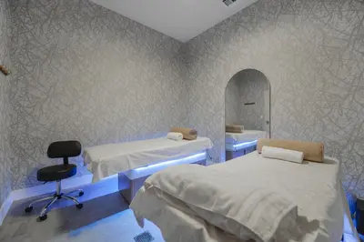 a hospital room with two beds and a mirror at Condo with Amazing Views in the Heart of Brickell in Miami