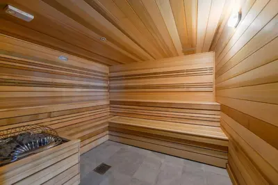 a sauna with wooden paneled walls and a wooden ceiling at Condo with Amazing Views in the Heart of Brickell in Miami