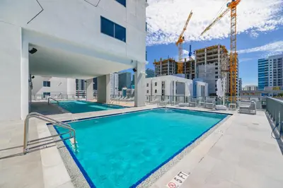 a swimming pool on the roof of a building at Condo with Amazing Views in the Heart of Brickell in Miami