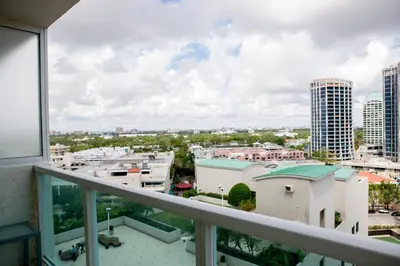 a balcony with a view of a city at Deluxe Studio in Coconut Grove City and Bay views Includes Parking in Miami