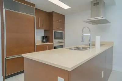 a kitchen with a sink and a counter top at Deluxe Suite King 1 Bedroom Icon in Miami