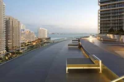 a row of benches on the roof of a building at Deluxe Suite King 1 Bedroom Icon in Miami
