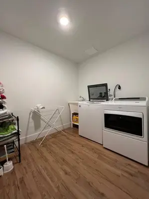 a kitchen with a white stove and a microwave at Super stylish 4 BR Home Steps from the Fun in Fort Lauderdale