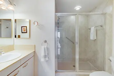 a bathroom with a shower and a sink at 2 BR Monthly beach condo Miami in Hallandale Beach