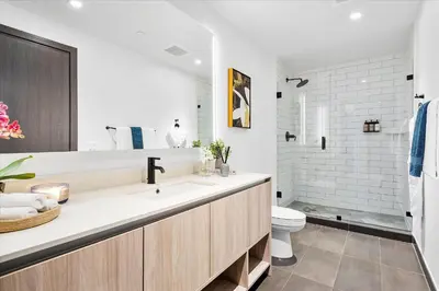 a bathroom with a sink and a toilet at Downtown by Miami Vacation Rentals in Miami