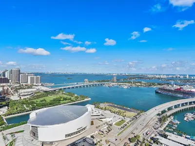 an aerial view of a city with a river and a bridge at Downtown by Miami Vacation Rentals in Miami