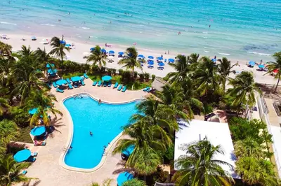 an aerial view of the beach and pool at a resort at Apt w/2 Queen Beds & Ocean View at Tides in Hollywood