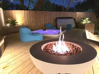 a fire pit in the middle of a patio at Villa Santa Maria in Cutler Bay