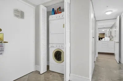 a white laundry room with a washer and dryer at Modern Bay View Balcony In The Grove Free Parking in Miami