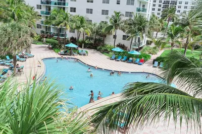 an overhead view of a swimming pool at a resort at Apt w/2 Queen Beds & Canal View at Tides in Hollywood