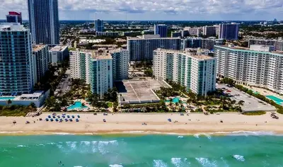 an aerial view of a beach in front of a city at Apt w/2 Queen Beds & Canal View at Tides in Hollywood
