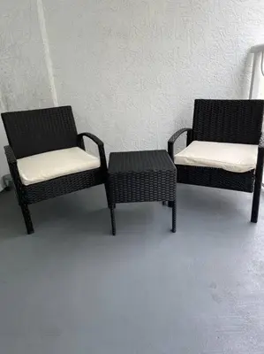 two chairs and a table in a room at Comfy 28th floor • Brickell • Ocean & City Views in Miami