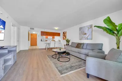 a living room with a couch and a table at Stunning 1 BDR 1 BTH • Brickell • Bay & City Views in Miami