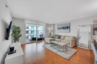 a living room with a couch and a table at 35th floor 1 BED 1 BTH • Brickell • Ocean View in Miami
