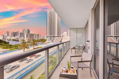 a balcony with a view of the city at Beachwalk Resort infinity Pool Balcony Views in Hallandale Beach