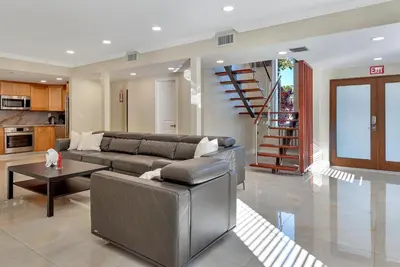 a living room with a couch and a table at Luxury Villa 5BR and 3BR in Hollywood Lakes near Beach in Hollywood