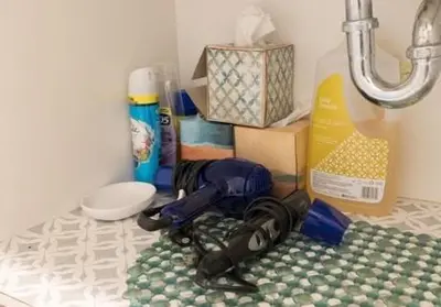 a corner of a bathroom with a sink and a floor at Komffy Apt w/2 Queen Beds & Canal View at Tides in Hollywood