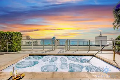 a hot tub on the roof of a building at Studio - Steps from Hollywood Boardwalk in Hollywood
