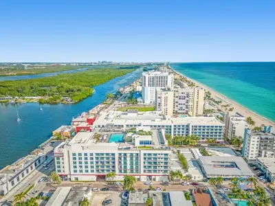 an aerial view of a resort on the beach at Studio - Steps from Hollywood Boardwalk in Hollywood