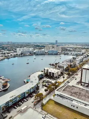 an aerial view of a city with a body of water at Beachwalk Studio W-Kitchenette Beach Pool Gym in Hallandale Beach
