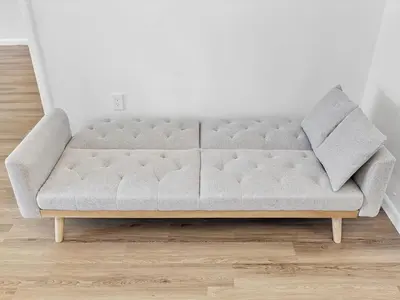 a couch in a room with a white wall at 3BR Newly Renovated In Miami 15 Min To Beach in Miami