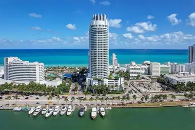 an aerial view of a city with boats in the water at Fontainebleau Miami Beach Junior Suite in Miami Beach