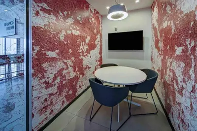 a room with a white table and two blue chairs at Luxurious Unit in Miami in Miami