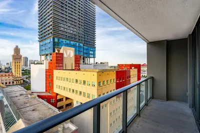 a view from the balcony of a building at Majestic unit in the heart of Downtown Miami in Miami