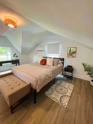 a bedroom with a large bed in a room at La Casita in Miami