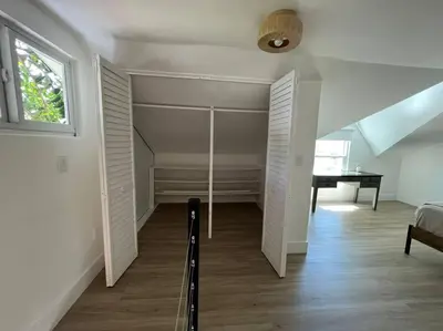 a room with a hallway with a baseball bat in it at La Casita in Miami