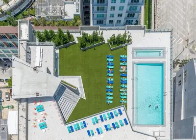 an overhead view of a pool with chairs and a pool at Sublime property in the heart of downtown Miami in Miami