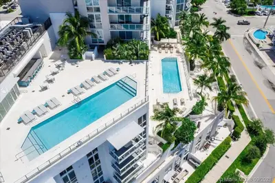 an aerial view of a building with a swimming pool at The Glamour of Upscale Downtown Ft. Lauderdale in Fort Lauderdale