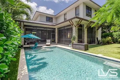a swimming pool in front of a house at Victoria Villa - Walk to Las Olas - 4 Bed 4 Bath in Fort Lauderdale