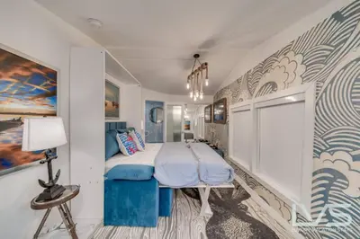 a bedroom with a bed in a room at Floridita 5Bed 4Bath FTL Paradise with Tiki Hut Heated Pool in Fort Lauderdale
