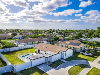 an aerial view of a residential neighborhood with houses at Chic Miami Private Pool Home in Cutler Ridge