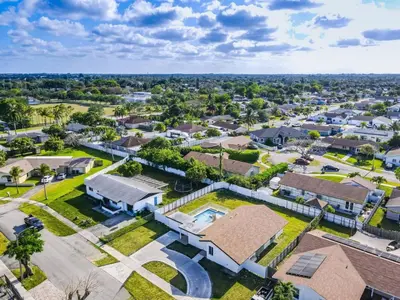 an aerial view of a residential neighborhood with houses at Chic Miami Private Pool Home in Cutler Ridge