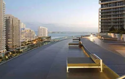 a row of benches on the roof of a building at Lovely 1BR W Icon Brickell-FREE SPA in Miami
