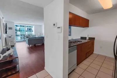 a kitchen with a sink and a stove top oven at Bay View 1 BDR 1 BTH • Brickell • Free Parking in Miami