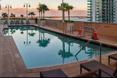 a large swimming pool on the roof of a building at Bay View 1 BDR 1 BTH • Brickell • Free Parking in Miami