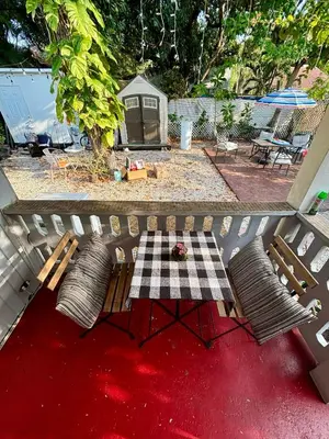 an overhead view of a patio with a table and chairs at Deluxe Room in best location Miami in a 2 Bedrooms Unit - Parking, Laundry and Luggage Storage in Miami