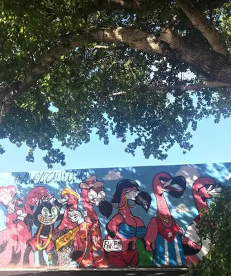 a mural on a wall under a tree at B2 Best Value on Private Bedroom with Private Bathroom in Little Havana, Miami in Miami
