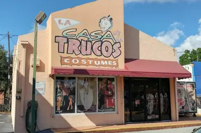 a store with a sign that reads casa trucos costumes at B2 Best Value on Private Bedroom with Private Bathroom in Little Havana, Miami in Miami