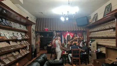 a group of people sitting at a table in a room at B6 Best Value on Private Bedroom with Private Bathroom in Little Havana, Miami in Miami