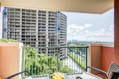 a balcony with a view of a tall building at Coconut Grove Beauty 1 bedroom Bayview Condo with Free Parking in Miami