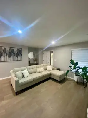 a living room with a white couch in a room at Cozy 2 Bedroom Modern Farmhouse in Miami in Tamiami