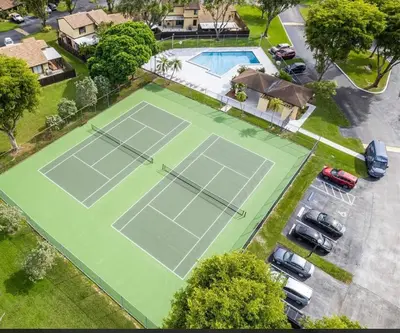 an overhead view of a tennis court in a parking lot at Cozy 2 Bedroom Modern Farmhouse in Miami in Tamiami