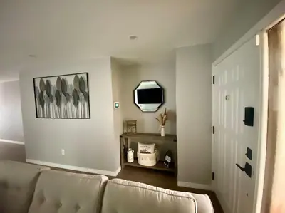 a living room with a couch and a tv at Cozy 2 Bedroom Modern Farmhouse in Miami in Tamiami