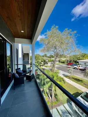 a balcony with a view of a street at Elements Las Olas w Pool and Spa Near Beach in Fort Lauderdale
