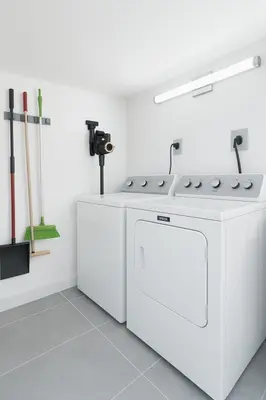 a white kitchen with a stove and a sink at Central Miami Oasis, Near Brickell, Grove & Little Havana in Miami