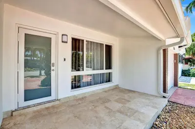 an empty house with a door and windows at Seaside Oasis in Hollywood Lakes near the Beach in Hollywood
